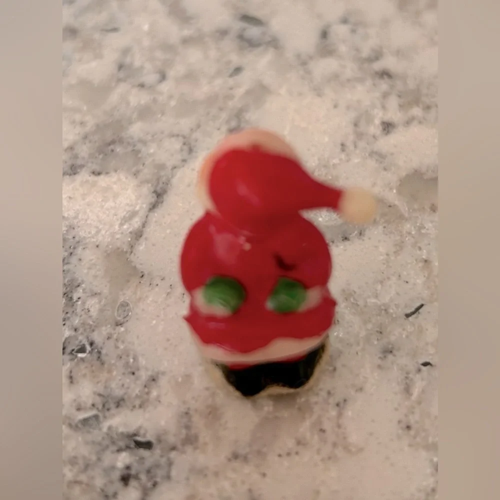 Vintage Kissing Santa Figurine
